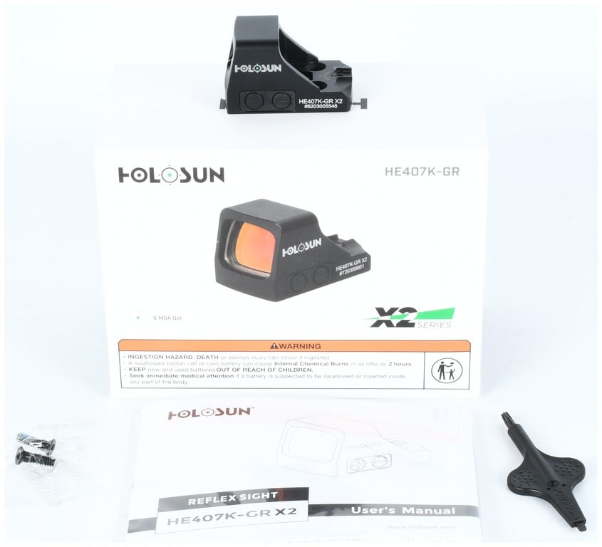 HOLOSUN HE407K-GR X2 Green Dot Open Reflex Sight, Serial #8203005546: This is a Holosun HE407K-GR X2 Open Reflex Optical Sight, designed primarily for compact handgun applications. The sight features a matte black aluminum housing and utilizes the X2 Series technology.