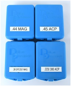 A Collection of Four Dillon Precision Caliber Conversion Kits for Reloading Presses