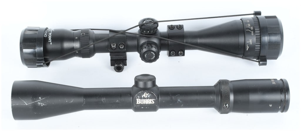 A Pair of Variable Power Rifle Scopes: CenterPoint 3-9x40AO and Burris 3X-9X 40mm FULLFIELD II: This lot consists of two variable power rifle scopes, both finished in matte black aluminum. The first scope is a CenterPoint 3-9x40AO. This scope is marked CENTERPOINT 3-9x40AO and bears the serial n