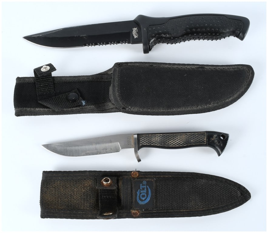 A Pair of Branded Fixed-Blade Utility Knives (Colt CT 20 and Walther Tactical Style): The lot consists of two modern fixed-blade utility knives, each with a fitted nylon sheath, for a total of two items. The first knife is a tactical-style fixed blade featuring a black-coated, partiall