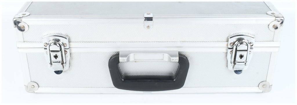 Aluminum Flight Style Carrying Case: A modern utility carrying case constructed in the style of a flight or equipment case, The exterior is finished with silver-toned aluminum or aluminum-clad paneling featuring a textured diamond patter