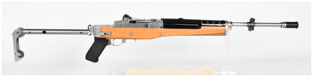 Sturm, Ruger & Co. Mini-14 Semi-Automatic Rifle, Caliber .223, Serial 186-06334: A single Sturm, Ruger & Co. Mini-14 semi-automatic rifle, chambered in Caliber .223. This rifle is configured with a desirable factory-style stainless steel side-folding stock assembly, paired with a