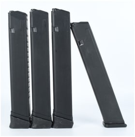 A Group of 4 Extended Capacity 9mm Pistol Magazines for Glock Pistols