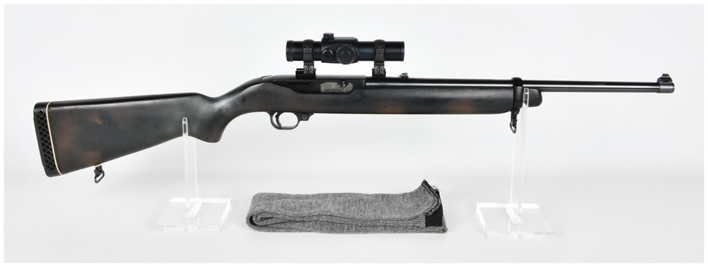Ruger Carbine Semi-Automatic Rifle .44 Magnum Caliber Serial Number 102-80897: A single semi-automatic Ruger Carbine rifle chambered in .44 Magnum caliber, serial number 102-80897. This rifle is configured with a blued steel barrel and receiver. The receiver is clearly marked