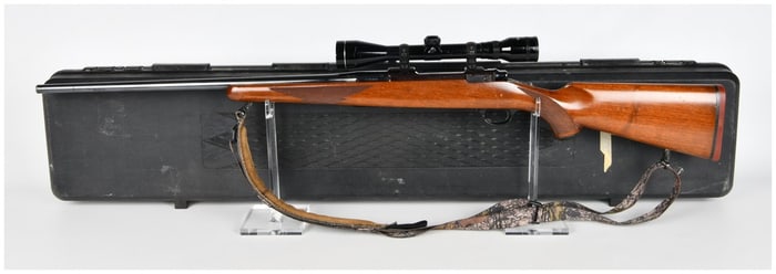 Ruger M77 Bolt Action Rifle in .25-06 REM. with Redfield Scope and Case