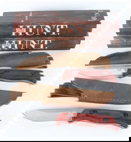 A Pair of Benchmade Fixed Blade Hunting Knives with Sheaths and Boxes