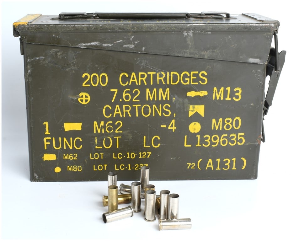 US Military 7.62MM NATO M13 Ammunition Can with Bulk Spent Cartridge Casings: This lot consists of one US Military issue M13 ammunition can, originally intended to hold 200 rounds of 7.62 MM NATO ammunition. The can is a standard metal ammo can configuration, finished in olive