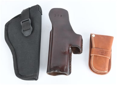 A Trio of Modern Firearm Accessories including Blackhawk! and G19 Holsters