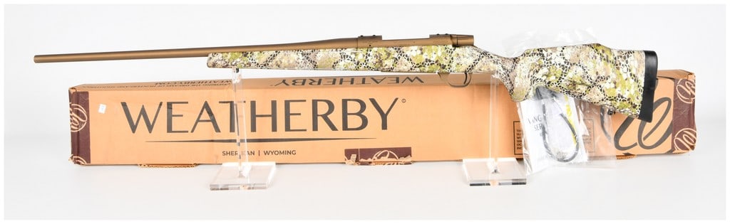 Weatherby Vanguard Badlands Bolt Action Rifle 6.5 PRC Serial VB321630: A modern Weatherby Vanguard Badlands bolt-action rifle manufactured by Howa in Japan. This rifle is chambered in 6.5 PRC (Precision Rifle Cartridge) and features a heavy sporter barrel profile. The me