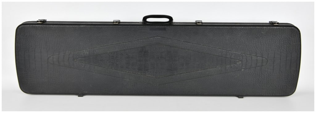 Plano Gun Guard DLX Double Scoped Rifle Case: A single hard-shell instrument or utility case identified through consensus as a Plano Gun Guard DLX Double Scoped Rifle Case. The case is constructed of black molded composite material featuring a te