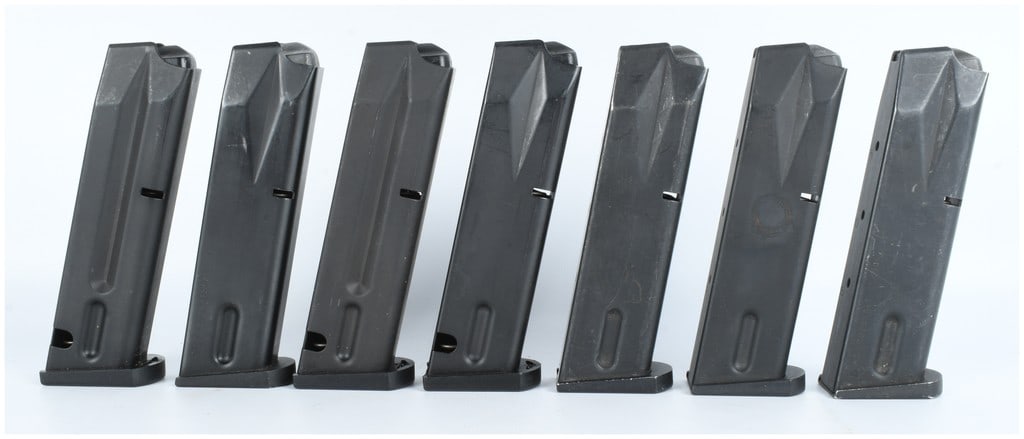 A Group of 7 Beretta 92-Series Pistol Magazines, 9mm Parabellum: A collection of seven detachable, double-stack pistol magazines designed for the Beretta 92-series (such as the 92FS or M9) chambered in 9mm Parabellum (9x19mm). These are factory accessories, indicat
