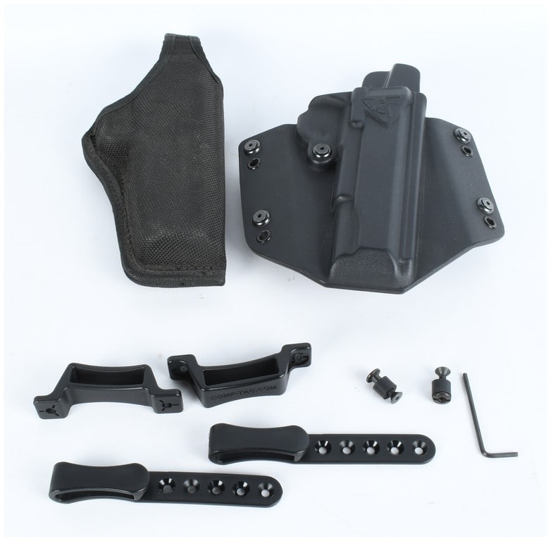 A Pair of Comp-Tac 1911 and Bianchi International Pistol Holsters with Mounting Accessories: This lot consists of two distinct pistol holsters and a collection of associated mounting hardware, suitable for various concealed and open carry applications.The first holster is a modern, rigid blac