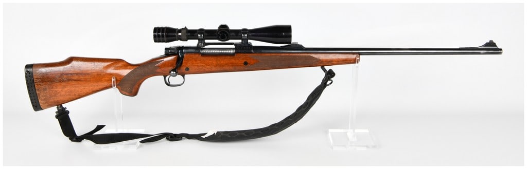 Winchester Model 70 XTR Bolt Action Rifle .264 Win. Magnum Serial Number G1376088: A single Winchester Model 70 XTR bolt-action sporting rifle chambered in the powerful .264 Winchester Magnum caliber. The rifle features a blued finish and is mounted in a classic gloss-finished woode