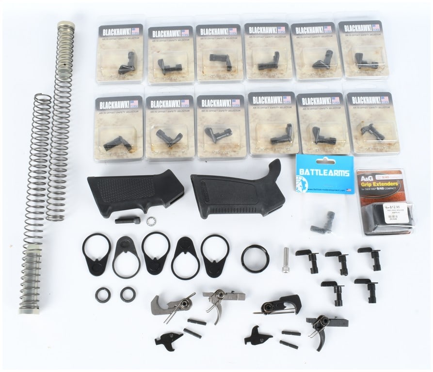A Collection of AR-15 Lower Receiver Components and Accessories including 14 Blackhawk! Offset: A substantial collection of firearm accessory components and parts kits primarily intended for the AR-15 platform, with some pistol accessories included. The lot contains no complete firearms,