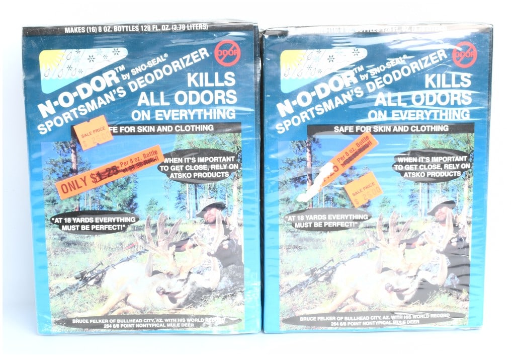 A Pair of N-O-DOR by SNO-SEAL Sportsman's Deodorizer Odor Control System Factory Sealed Boxes: This lot consists of two factory-sealed retail boxes of N-O-DOR by SNO-SEAL Sportsman's Deodorizer Odor Control System, manufactured by ATSKO Products. The product is advertised as an odor control