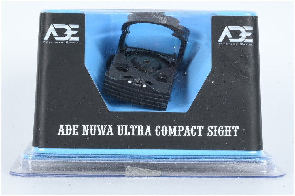 ADE Advanced Optics NUWA Ultra Compact Red Dot Sight Model RD3-021: This lot consists of one ADE Advanced Optics NUWA Ultra Compact Sight, Model RD3-021. This is a new-in-box red dot sight designed for use on pistols and other firearms, featuring a compact footprint.