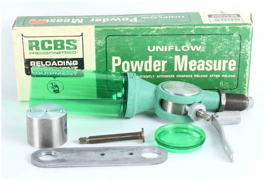 RCBS Uniflow Powder Measure Reloading Equipment with Accessories and Original Packaging: This lot consists of one RCBS Uniflow Powder Measure, a piece of manual reloading equipment designed for dispensing precise charges of smokeless powder into metallic cartridges. The assembly features