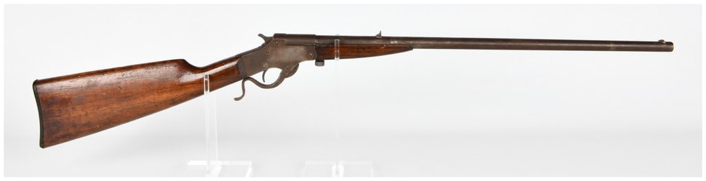 J. Stevens Arms Company Roman Single Shot Rifle in .22 Long Rifle: A J. Stevens Arms Company Roman Model single-shot rifle chambered for the .22 Long Rifle cartridge. This rifle utilizes a falling-block action operated by a curved underlever that also functions as th