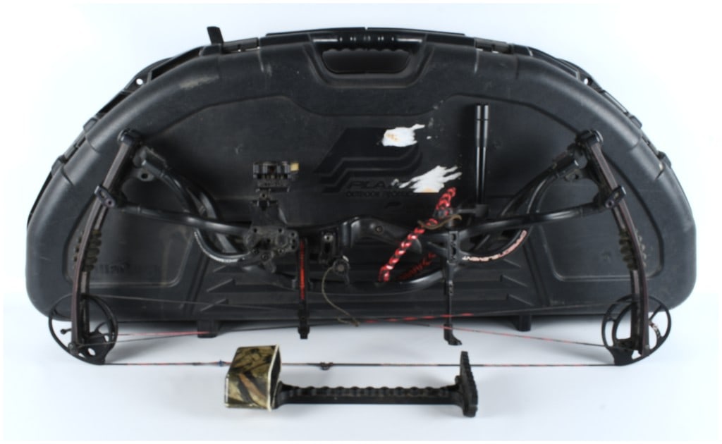 Hoyt Carbon Element Compound Bow Assembly with Plano Hard Case: Hoyt Carbon Element Compound Bow Assembly. The bow features a high-performance, matte black advanced carbon construction riser, clearly marked HOYT CARBON TECHNOLOGY and CARBON ELEMENT. The riser