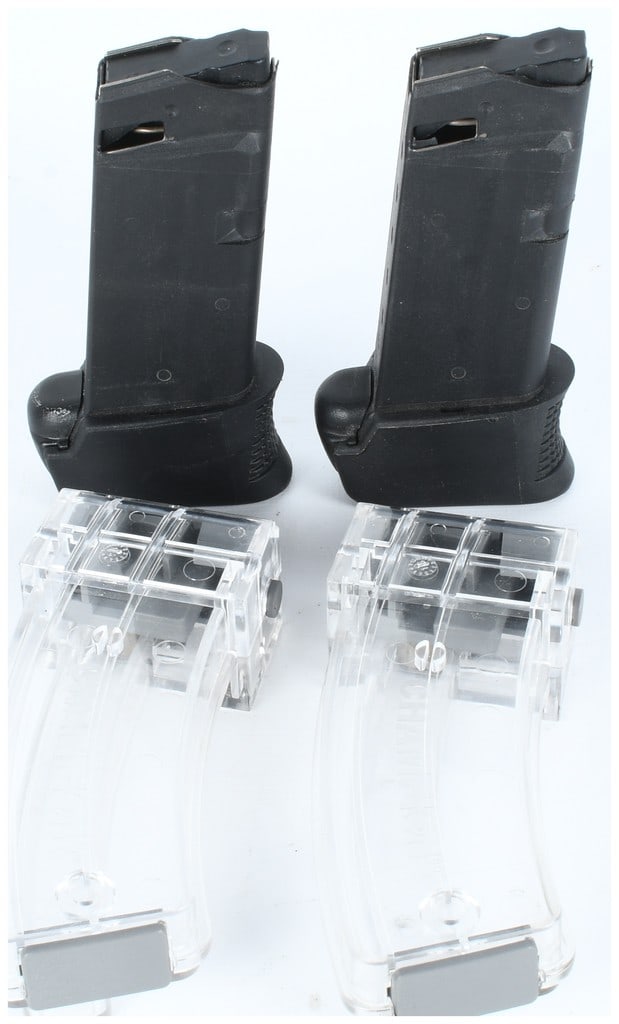 A Collection of 4 Firearm Magazines 2 Glock .45 ACP and 2 Ruger 10/22: A collection of four (4) firearm magazines, consisting of two factory Glock magazines with extensions and two Ruger 10/22 polymer magazines. The two Glock magazines are constructed of black polymer