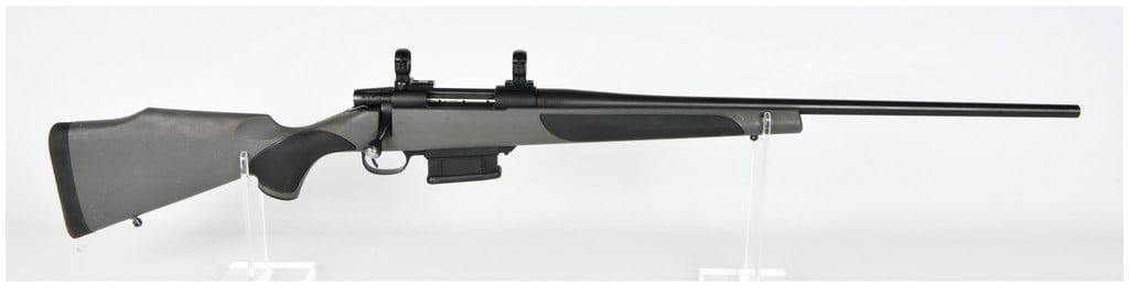Weatherby Vanguard Bolt Action Rifle 6.5 Creedmoor Serial Number VB177205: A modern Weatherby Vanguard bolt-action sporting rifle chambered in 6.5 Creedmoor. The rifle features a heavy profile barrel and a matte black finish on the metal components. The action is housed in