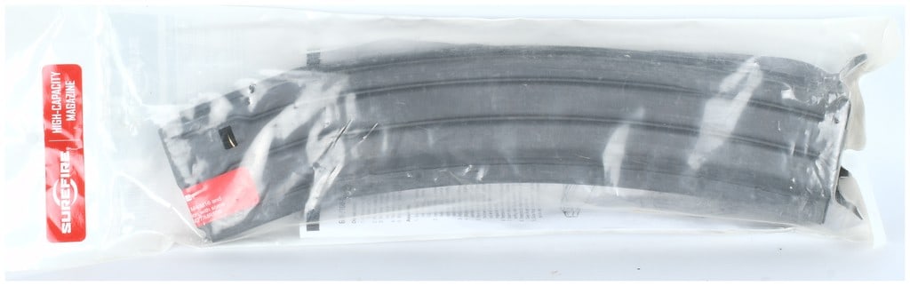 SureFire MAG5-100 Quad-Stack High-Capacity Magazine: One SureFire MAG5-100 high-capacity accessory magazine designed for AR-15/M4 pattern rifles, typically chambered in 5.56x45mm NATO or .223 Remington. The magazine is a quad-stack design, evidenced by