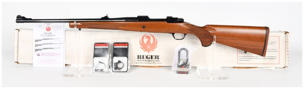 Ruger M77 Hawkeye Bolt Action Rifle in .338 RCM (20 inch BBL) Serial Number 711-57000: This is a modern Ruger M77 Hawkeye bolt-action rifle, confirmed by receiver markings and the original factory box label. The rifle is chambered in the powerful .338 RCM (Ruger Compact Magnum)