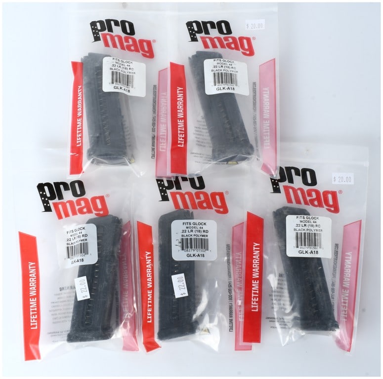 A Group of 5 Pro Mag GLK-A18 18-Round Magazines for Glock Model 44 .22 LR: A group of five (5) new-in-package Pro Mag aftermarket magazines. Each magazine is designated GLK-A18, designed to fit the Glock Model 44 pistol. They are constructed of black polymer and have an