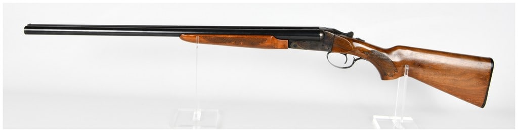Savage/Fox Model B-SE Series H Side-by-Side Shotgun, 12 Gauge (28" BBL): This is a Savage/Fox Model B-SE Series H break-action, hammerless side-by-side shotgun. The firearm is chambered for 12 Gauge shells with a 2 3/4-inch chamber. The barrels are 28 inches long,