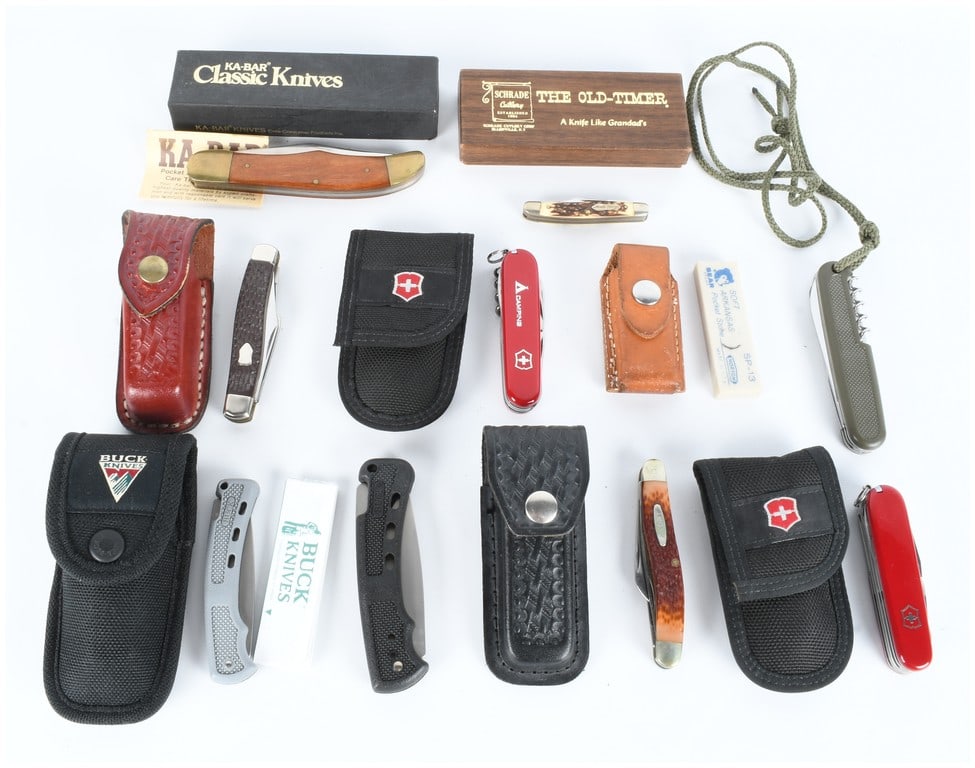 A Collection of 9 Vintage Pocket Knife and Multi-Tool Lots including KA-BAR Schrade and Victorinox: This collection comprises 9 distinct lots of vintage folding knives, multi-tools, and accessories from recognized manufacturers. Key components include a KA-BAR folding hunter knife (Model 1183) featu