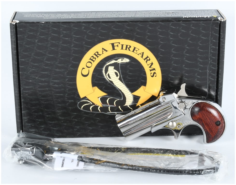 Cobra Enterprises Model C22M Derringer Pistol, Caliber .22 Magnum, Serial Number 123321: Cobra Enterprises Model C22M break-action over/under derringer pistol, Serial Number 123321. This modern derringer is chambered in the potent .22 Magnum (WMR) rimfire caliber. The pistol features a