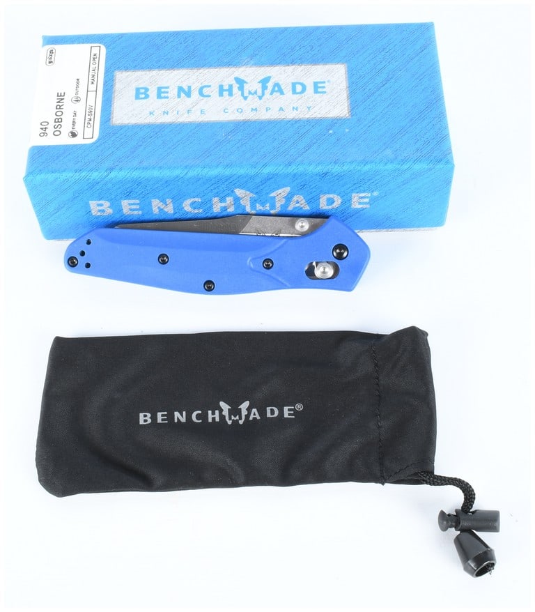 Benchmade 940 Osborne CPM-S90V Folding Knife: This lot consists of a Benchmade Model 940 Osborne Design manual-open folding knife and an RCBS reloading die set. The knife features bright blue handle scales and a satin-finished reverse tanto blade