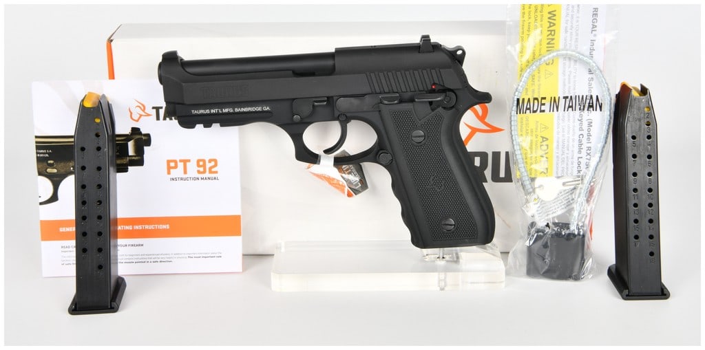 Taurus Model 917 C Semi-Automatic Pistol, 9mm PARA, SN AEJ704942: Taurus Model 917 C semi-automatic pistol, Serial Number AEJ704942. This lot contains 2 items. The pistol features a matte black finish and black polymer grips, designed in the style of the Beretta 92/