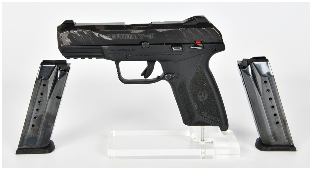 Ruger Security-9 Semi-Automatic Pistol, 9mm Luger: This lot consists of 2 items: one Ruger Security-9 semi-automatic pistol chambered in 9mm Luger, accompanied by two detachable box magazines. The pistol features a modern striker-fired design with a b