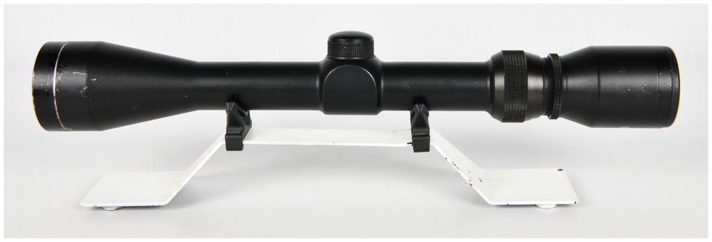 Tasco 3-9x40 Model 39X40SPL Adjustable Objective Riflescope: This is a Tasco variable power riflescope, identified by the markings as the 3X-9X.40, Model 39X40SPL. The scope features a matte black finish and variable magnification ranging from 3 power to 9 powe