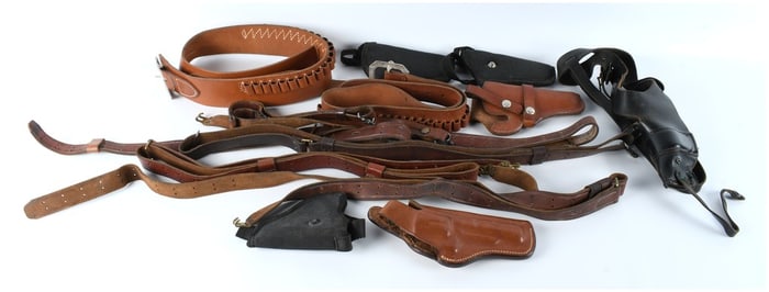A Collection of Vintage and Modern Firearm Accessories Including Five Holsters and Multiple Leather
