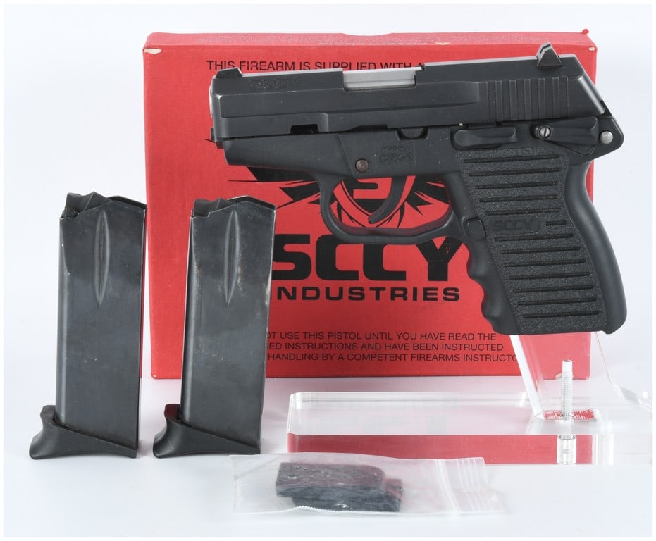 SCCY Industries Model CPX-1 Semi-Automatic Pistol 9mm Serial 031030: SCCY Industries Model CPX-1 semi-automatic pistol, Serial Number 031030. This modern compact pistol features a black polymer frame with aggressive texturing and finger grooves, designed for concealed