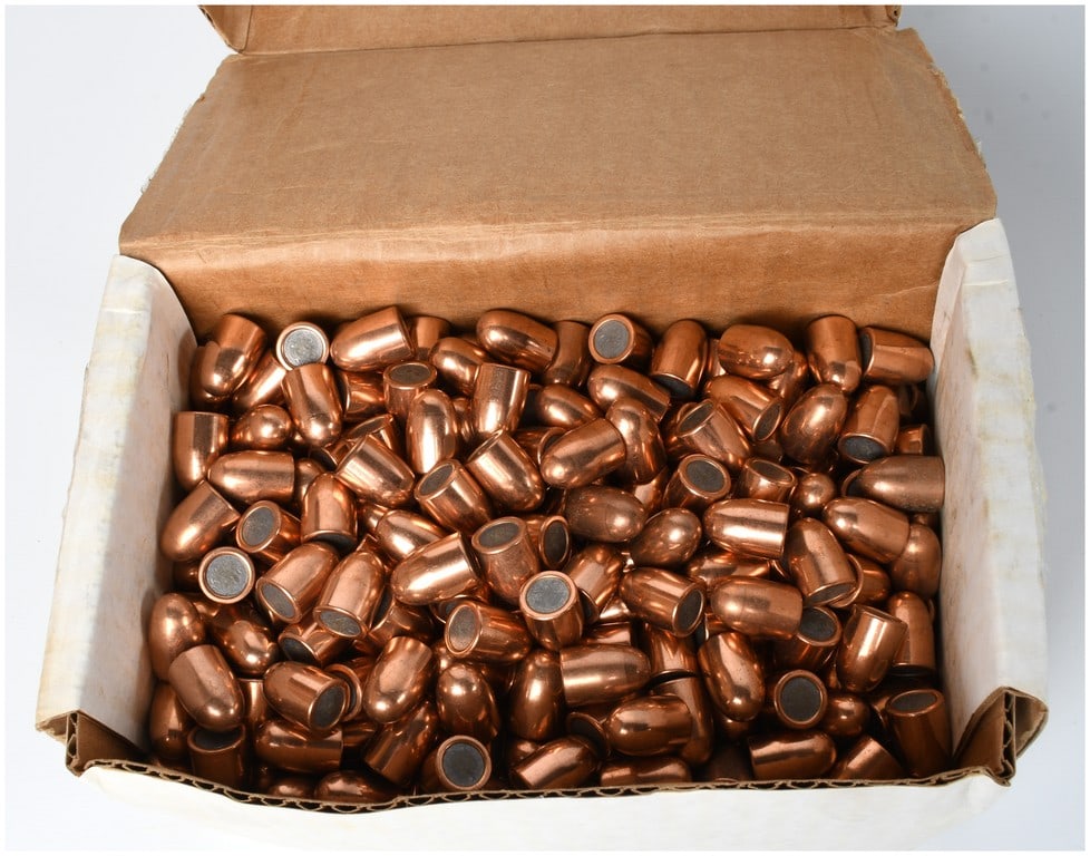 A Lot of 500 9mm Plated Round Nose Reloading Projectiles: This lot consists of 500 individual projectiles intended for use as reloading components. Based on visual characteristics and web intelligence consensus, these are identified as 9mm (.355 diameter)