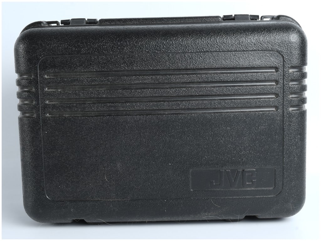 JVC Hard Shell Black Plastic Carrying Case: This is a single JVC hard-shell plastic carrying case, The case is constructed of black textured plastic featuring a molded handle, two plastic snap latches, and three horizontal molded ribs. The JVC