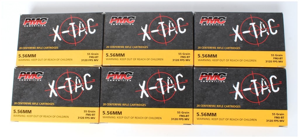 Lot of 120 Rounds PMC X-TAC 5.56MM 55 Grain FMJ-BT Centerfire Rifle Ammunition: A lot consisting of six (6) factory boxes of PMC X-TAC 5.56MM Centerfire Rifle Cartridges, totaling 120 rounds. Each box is marked as containing 20 rounds of 5.56MM ammunition. The specific load is