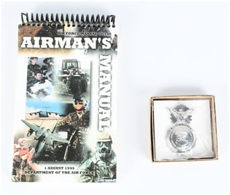 A Pair of U.S. Air Force Collectibles: 1999 Airman's Manual 10-100 and Numbered Security Police