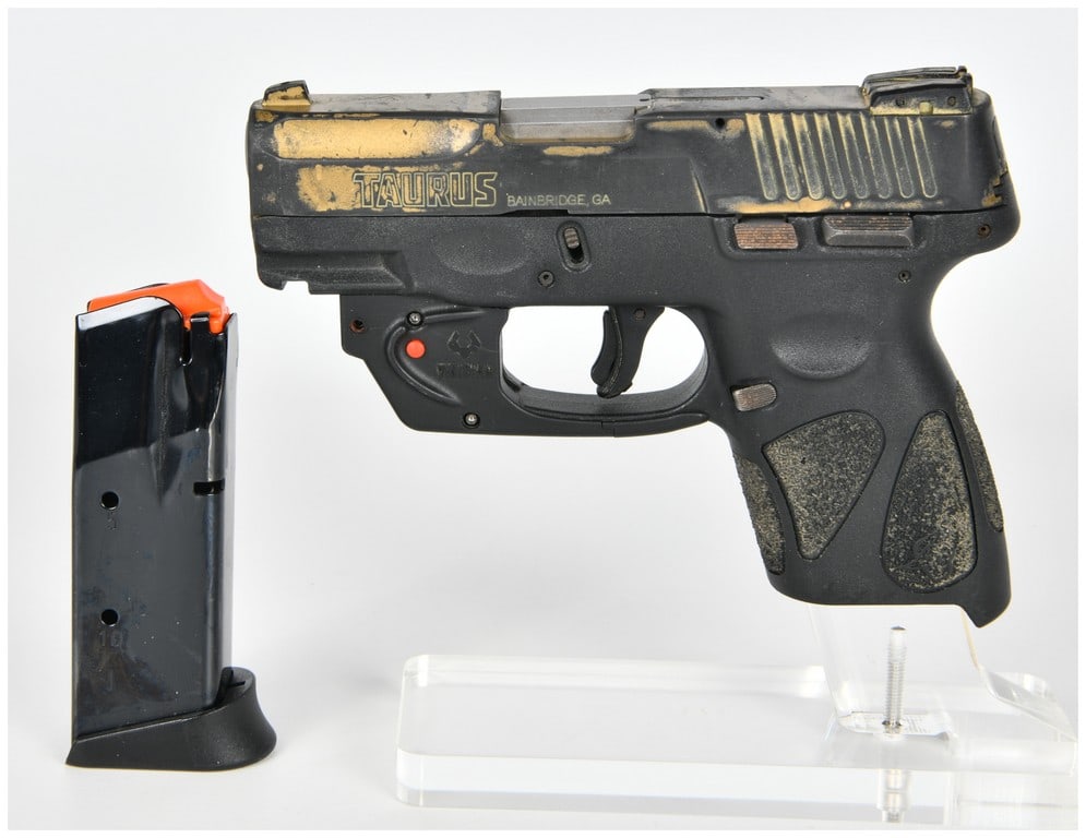 Taurus G2C Semi-Automatic Pistol .40 S&W Serial Number ADM999145: Taurus G2C semi-automatic pistol chambered in .40 S&W. This subcompact pistol features a black polymer frame and a steel slide. The slide is marked G2C 40 S&W and bears the manufacturer markings TAURU