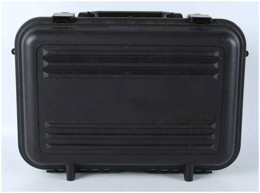 Doskocil Vantage Hard Plastic Protective Carrying Case: A single Doskocil hard plastic protective carrying case, branded VANTAGE on the exterior face. The case is constructed from black molded hard plastic featuring horizontal ribbed detailing and rounded