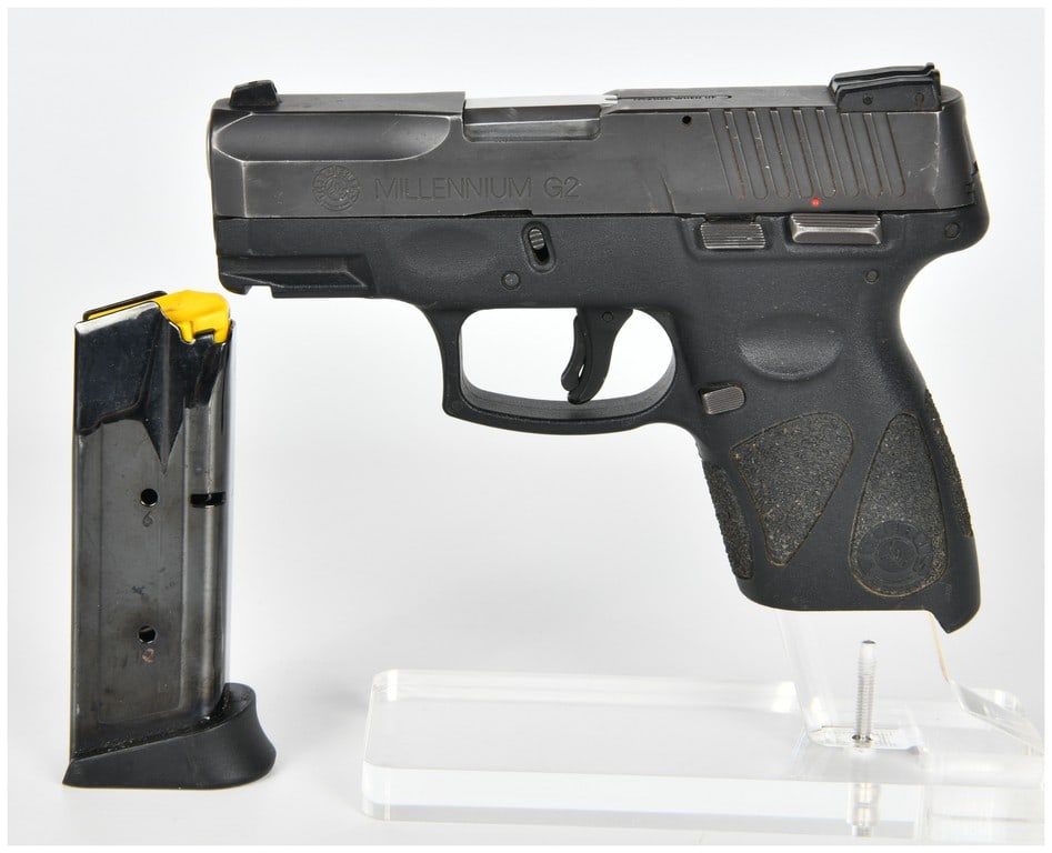 Taurus PT111 G2 Millennium Semi-Automatic Pistol, 9mm, SN TJX59550: A single Taurus PT111 G2 Millennium semi-automatic pistol, Serial Number TJX59550. This is a striker-fired pistol chambered in 9mm Luger (9x19 Para), featuring a black polymer frame and a matte black