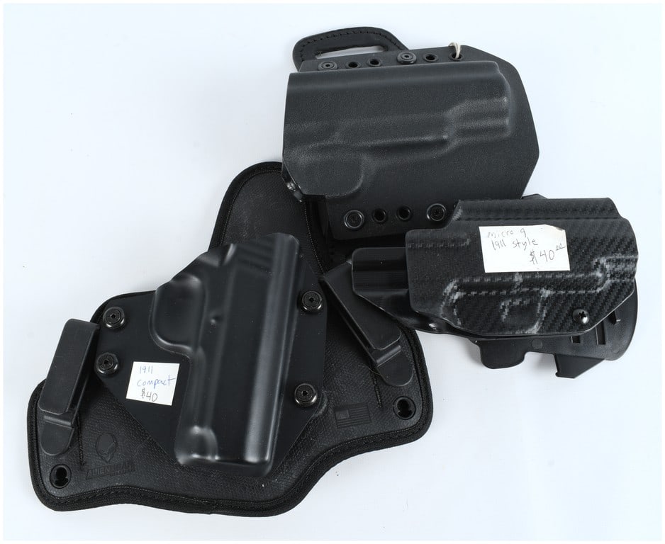 Alien Gear and Assorted 1911 Style Handgun Holsters, Three Pieces, Circa 2015-2023: This lot features a collection of three contemporary handgun holsters designed for 1911-style firearms. The primary item is an Alien Gear Holsters hybrid IWB (Inside the Waistband) model, identified a