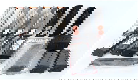 Lot of Seventeen Assorted Pistol Magazines and Accessories, Including Smith & Wesson, SIG Sauer, and