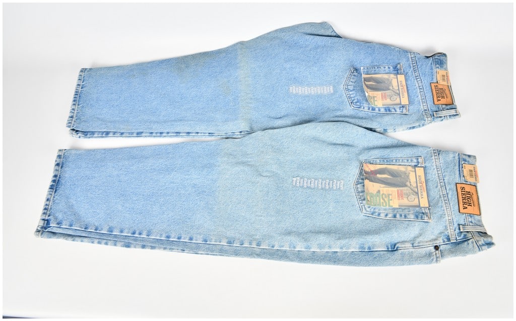 Two Brand New High Sierra Authentic Dungarees Denim Jeans: A pair of High Sierra Authentic Dungarees denim jeans featuring a loose fit and light wash finish. These two pants are constructed from 100% heavyweight cotton denim and retain their original manufact