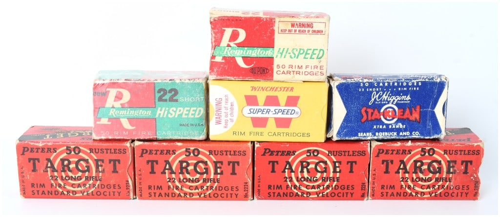Remington, Winchester, Peters, and J.C. Higgins Vintage .22 Ammunition Collection, circa 1940-1960: This lot features a collection of eight vintage rimfire ammunition boxes from the mid-20th century, representing a cross-section of major American manufacturers. The assembly includes four Peters Rust