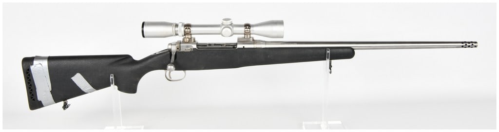 Savage Model 116 Bolt-Action Rifle .338 Win Mag Stainless Heavy Barrel Late 20th Century: A robust, weather-resistant bolt-action rifle manufactured by Savage Arms Inc. of Westfield, Massachusetts. This is the Model 116, a popular design known for its durable stainless steel construction i