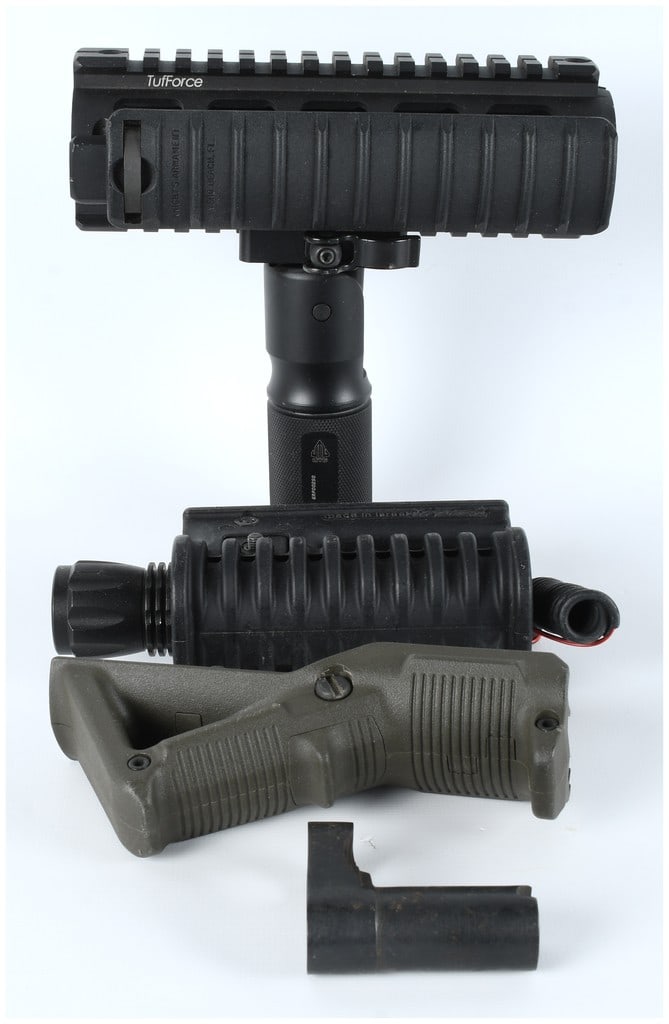 Mixed Lot of Four Tactical Firearm Accessories Including Knight's Armament and Israeli Foregrips: A collection of four modern tactical firearm accessories designed for rail-equipped rifles, carbines, or shotguns. This lot includes various foregrips and mounting components. Item 1 is an assembled u